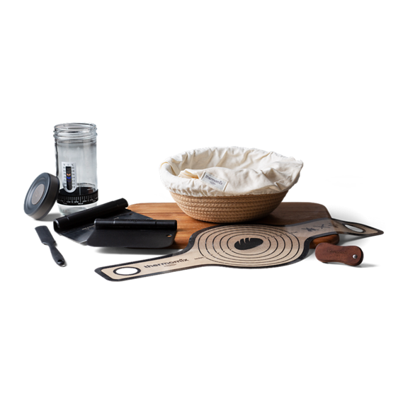Brotbackzubehör mit Gärkorb Teigschaber Silikonmatte Glasbehälter und Schneidebrett
