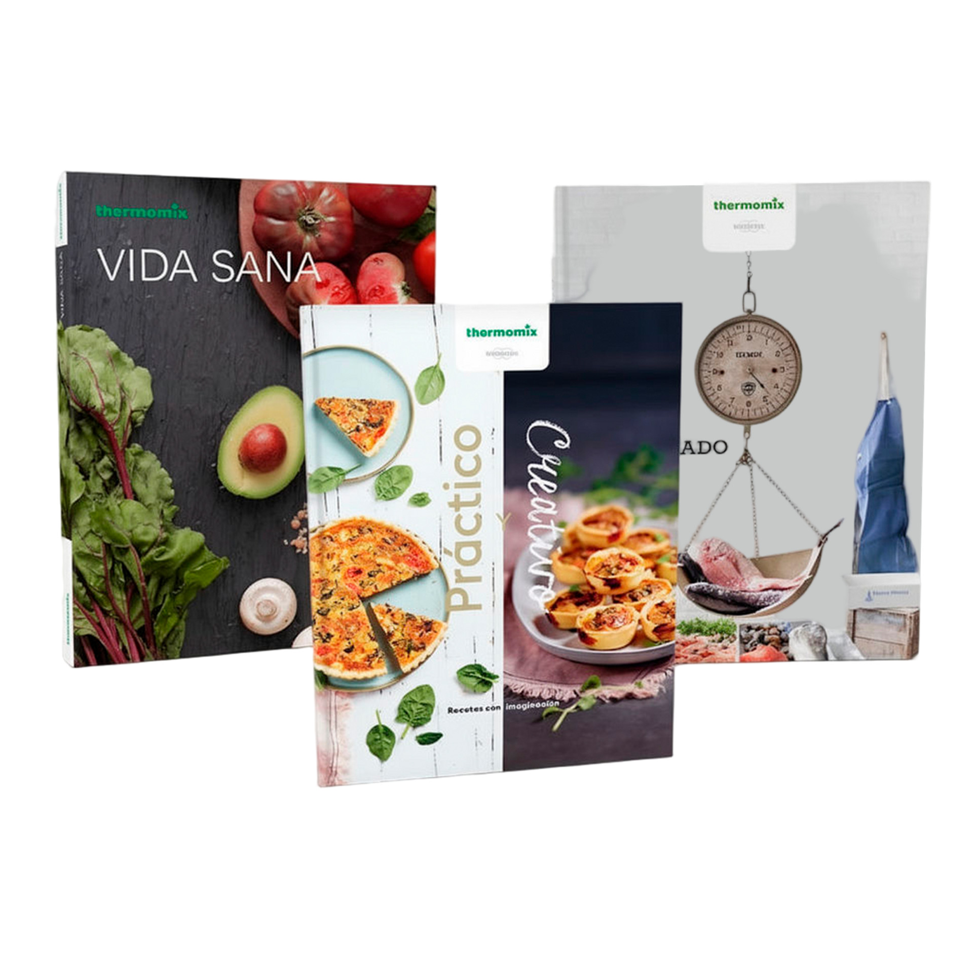 Tres libros de cocina para Thermomix® TM6 en español, de pie, cada uno con portada temática de comida.