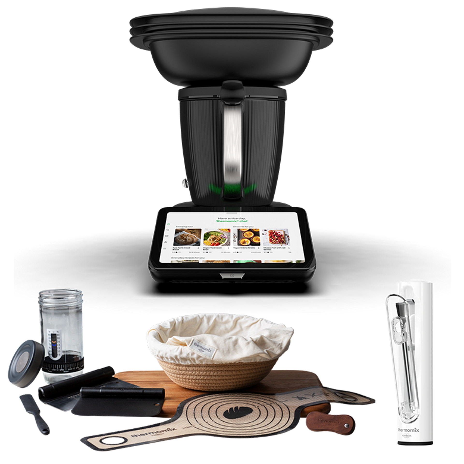 Thermomix® TM7 avec Varoma, Thermomix® Sensor et accessoires de boulangerie, dont bocal, panier et tapis.