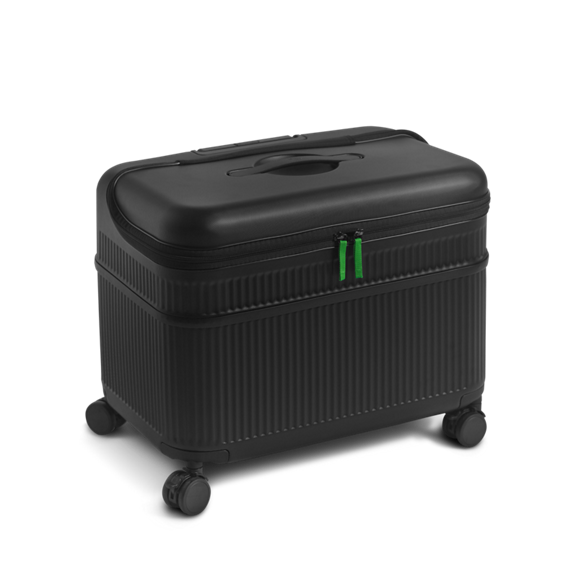 Black hard shell trolley case with green zipper pulls and four wheels designed for transporting appliances or accessories