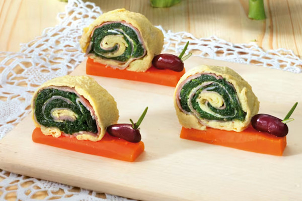 Lumachine farcite con spinaci e prosciutto.