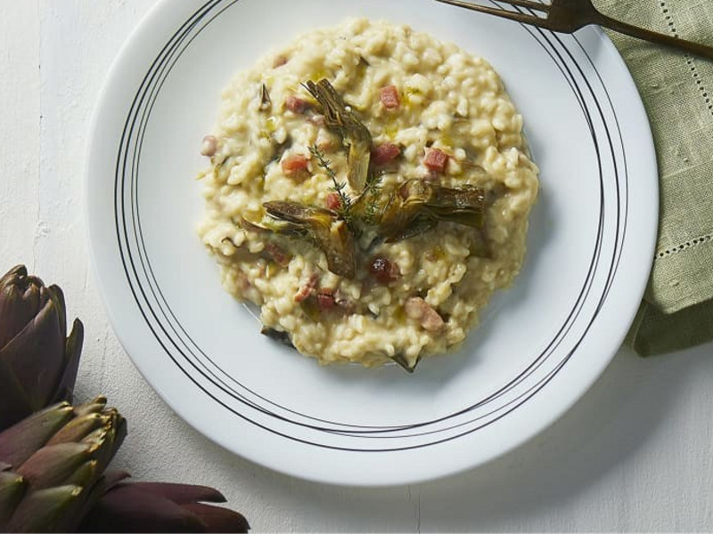 Segui la nostra ricetta passo-passo per un risotto ai carciofi perfetto, preparato facilmente con Bimby®. 