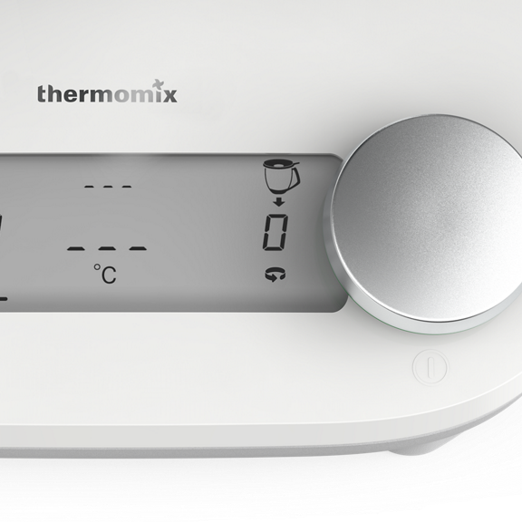 Close up of the Thermomix TM6 control panel showing the display with a silver dial on the right