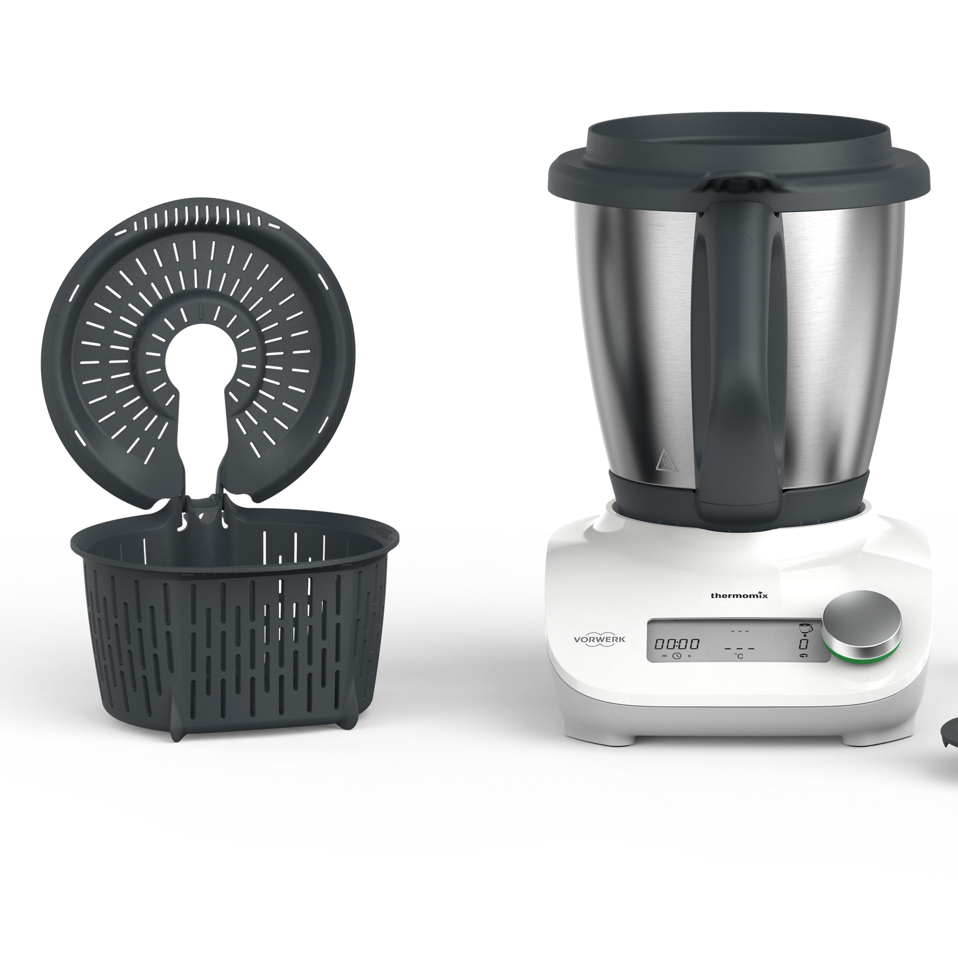 Thermomix® Friend with mixing bowl, simmering basket, lid, measuring cup, and spatula, arranged on a white surface.