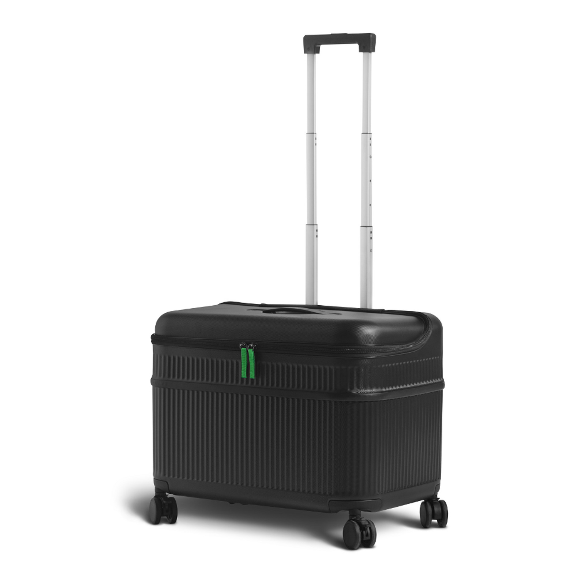 Black rolling suitcase with green zipper pulls and extended telescopic handle, placed on four wheels.