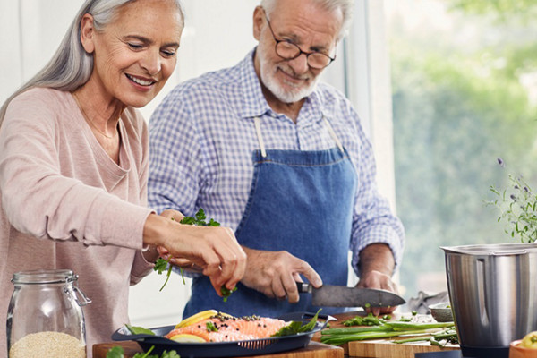 Thermomix studios cooking man and woman