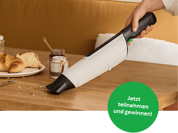 Kobold Akku-Handstaubsauger saugt Krümel vom Tisch