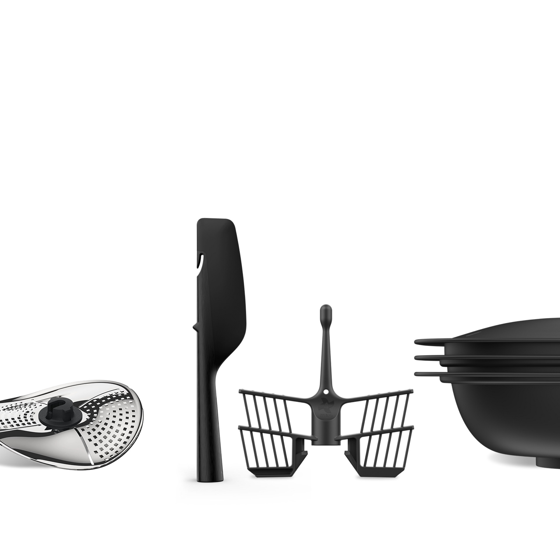 Akcesoria Thermomix® TM7: obieraczka, szpatułka, motylek i tacka Varoma.