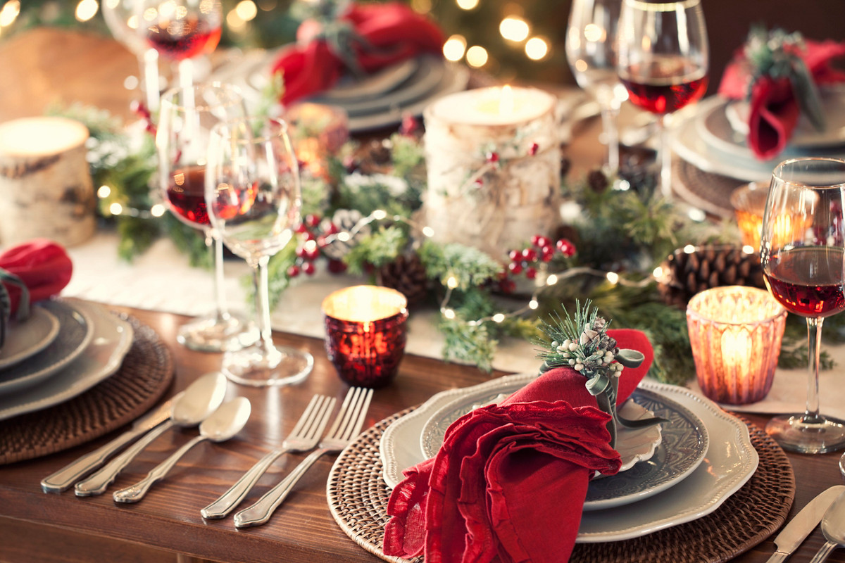 Christmas holiday dining table elegant place setting. Very shallow depth