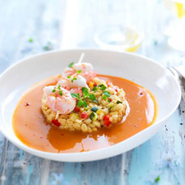 Brochette de langoustines et leur bisque, blé aux petits légumes