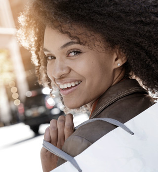 fr kobold blog woman smiling bag shoulder