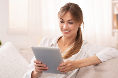 fr thermomix woman checking tm6 demonstration tablet