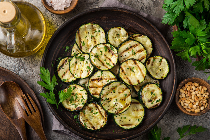 grilled zucchini on plate, top view,