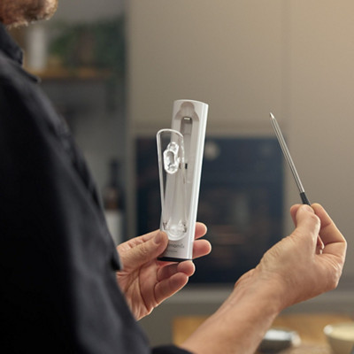 Man uses Thermomix® and Thermomix® Sensor for baking bread