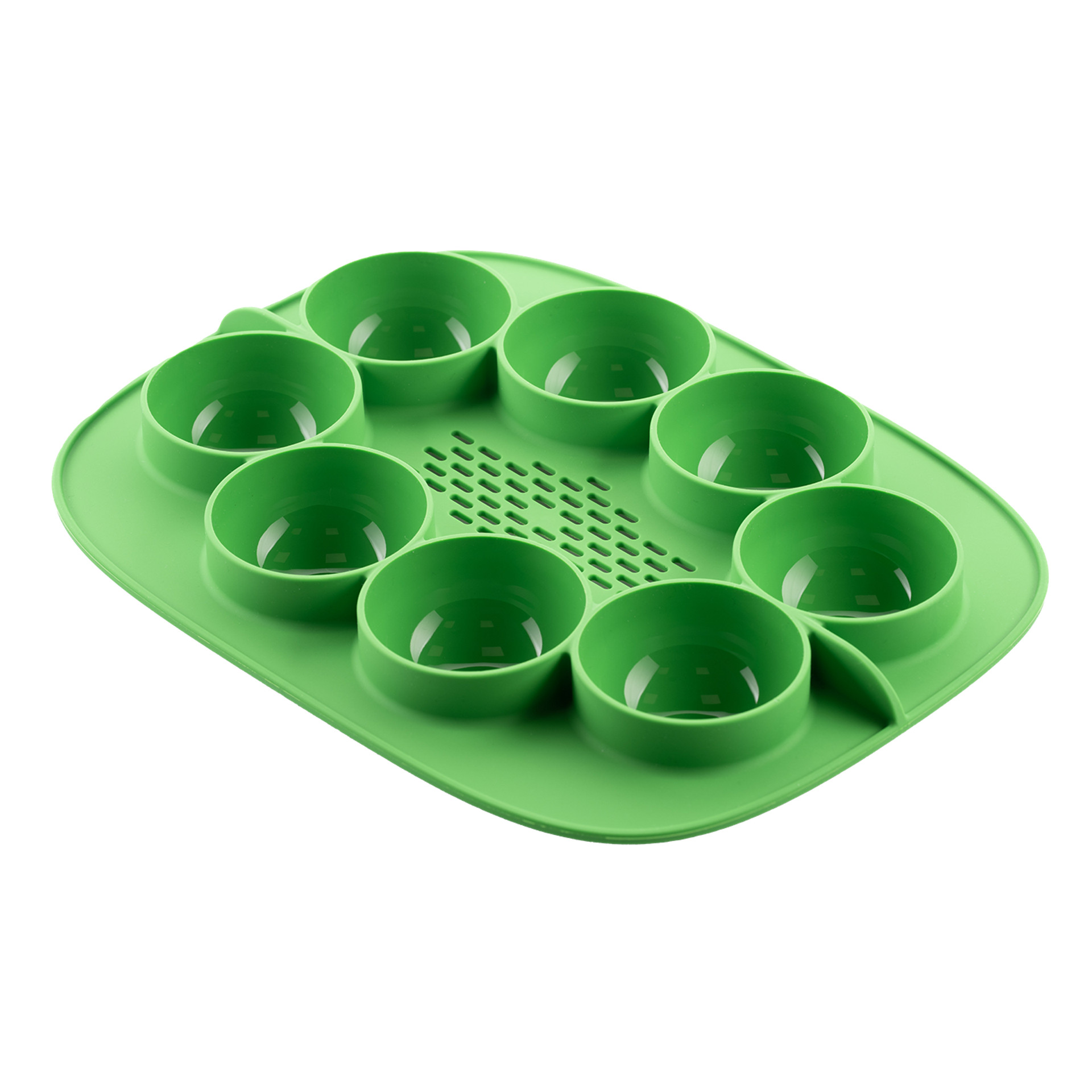 Zielona foremka silikonowa z ośmioma okrągłymi wgłębieniami do przygotowywania małych porcji lub przekąsek.
