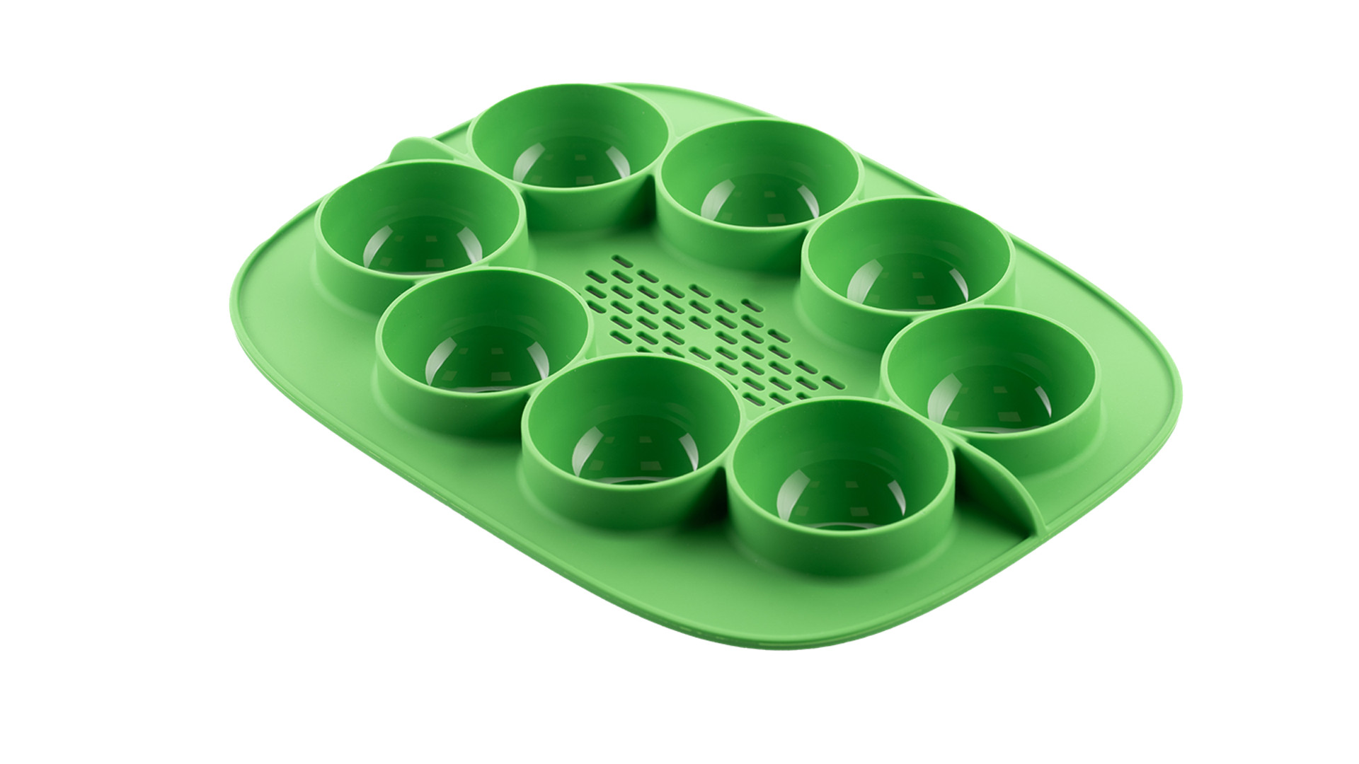 Zielona silikonowa tacka z ośmioma okrągłymi wgłębieniami, przeznaczona do gotowania na parze jajek lub porcji.