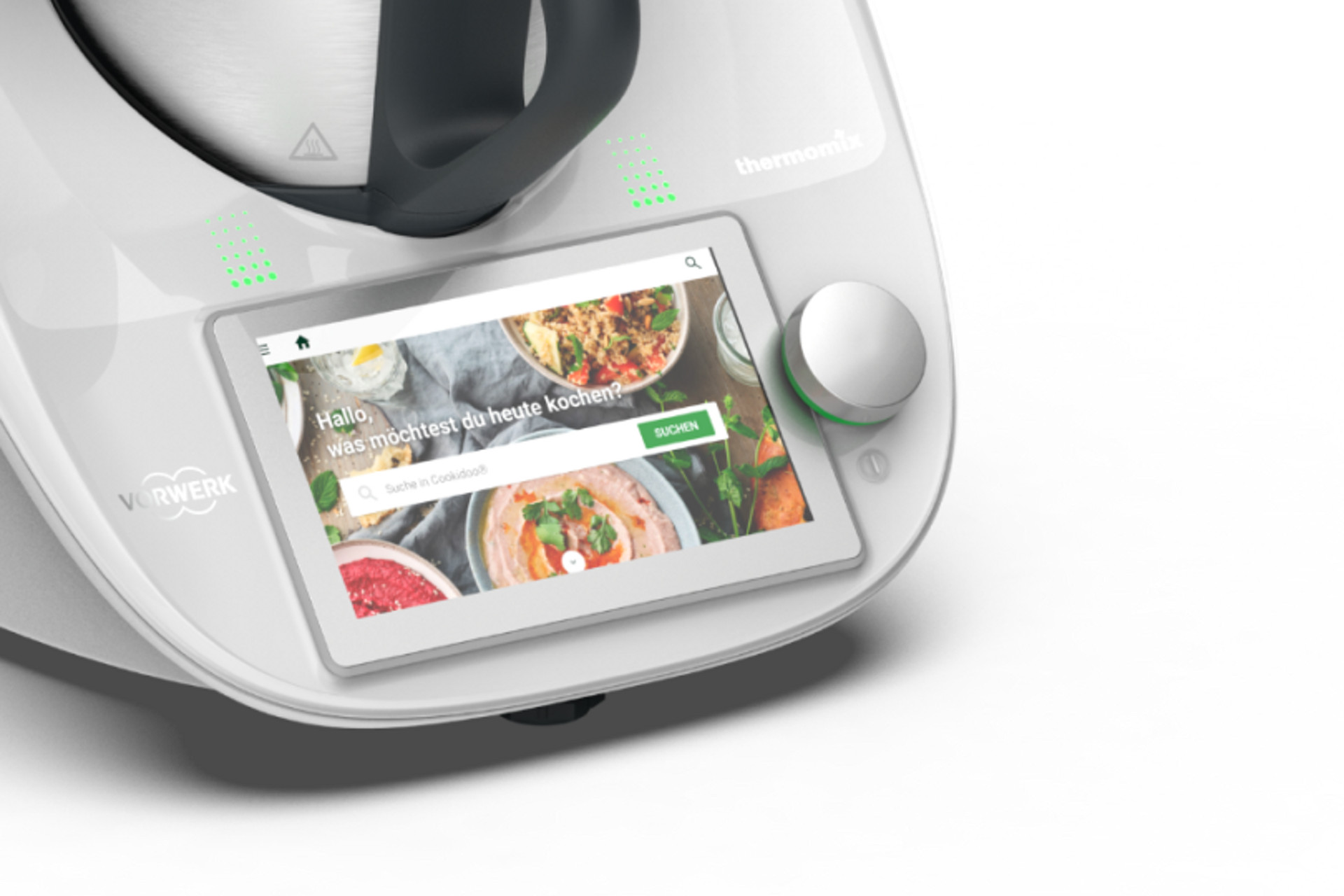 Primer plano de la pantalla del Thermomix® TM6 mostrando la búsqueda de recetas con imágenes de comida.