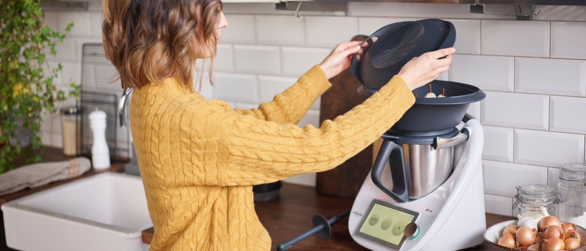 int thermomix tm6 in use woman in yellow