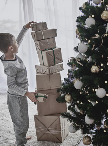 kobold blog christmas tree boy with presents