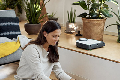 kobold blog vr300 cleaning room with woman