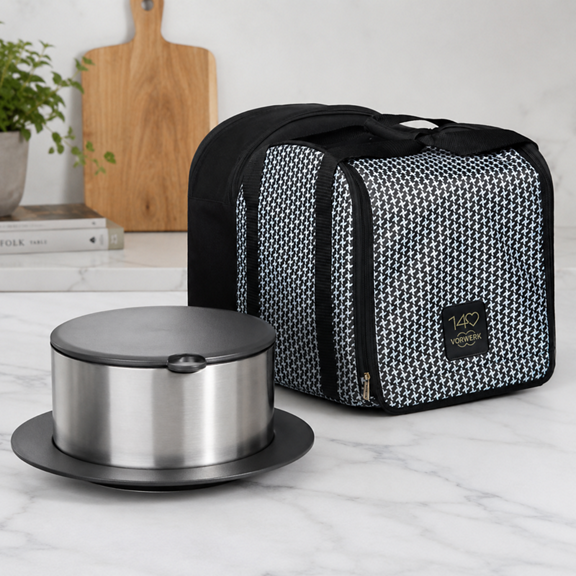 Recipiente isolado com tampa preta e bolsa de transporte padrão pied de poule ambos com logo 140 anos Vorwerk