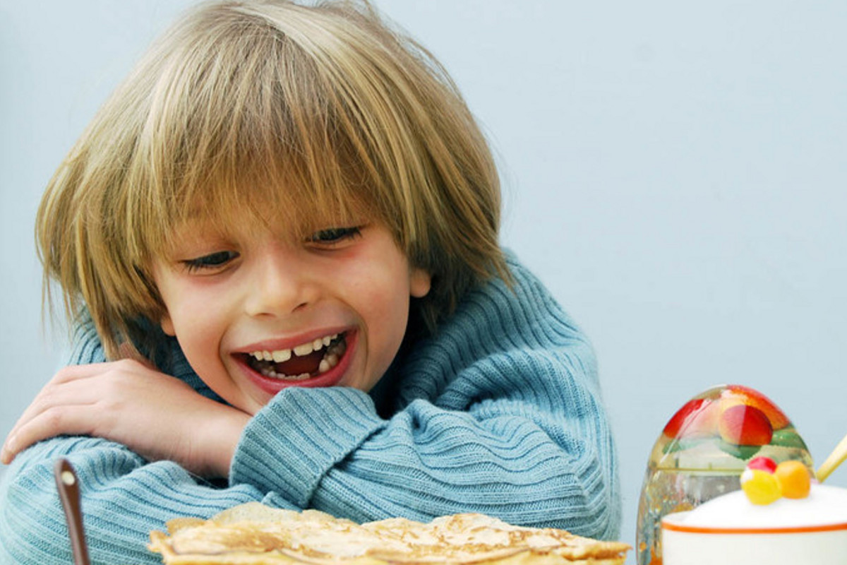 thermomix blog kid smiling at crepes