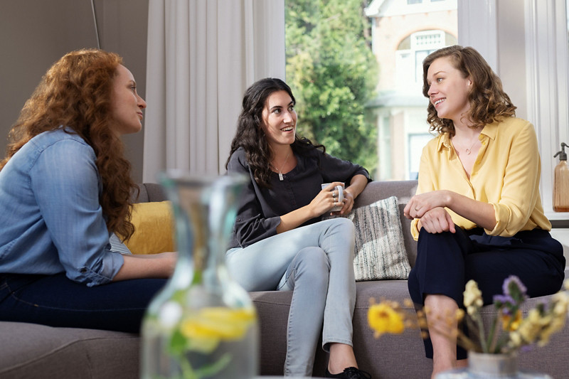 vw advisor branding career livingroom couch women advisor talking