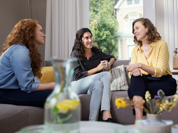 vw advisor branding career livingroom couch women advisor talking